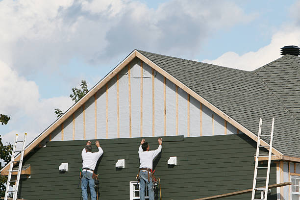 Professional Siding Installation technician working in Greensburg, IN